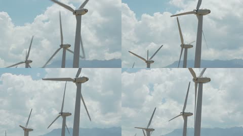 特写风车转动风能发电新能源