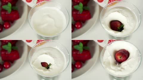 草莓落入牛奶中视频素材