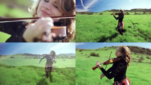 绿色草地上小提琴表演