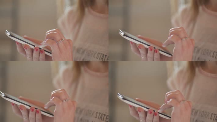 美女使用触摸屏智能手机上网聊天