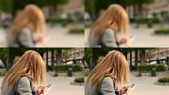 街头女孩微信发信息玩手机