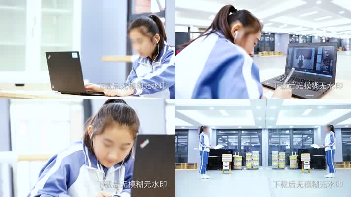 正在认真用电脑学习的女孩对镜子练习