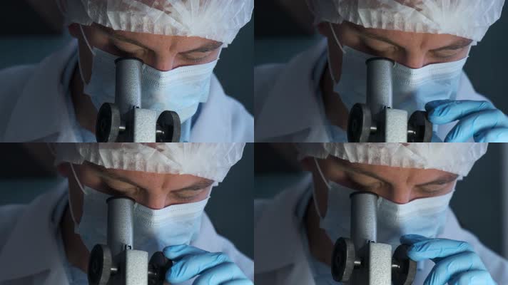  医生 观察显微镜  