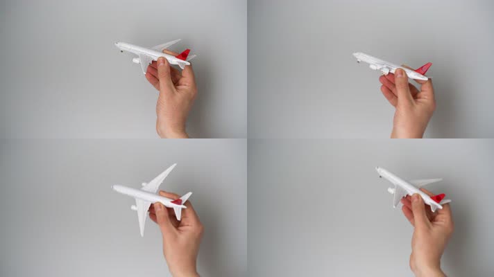 手拿玩具飞机 飞机模型  