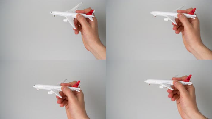 手拿玩具飞机 飞机模型  