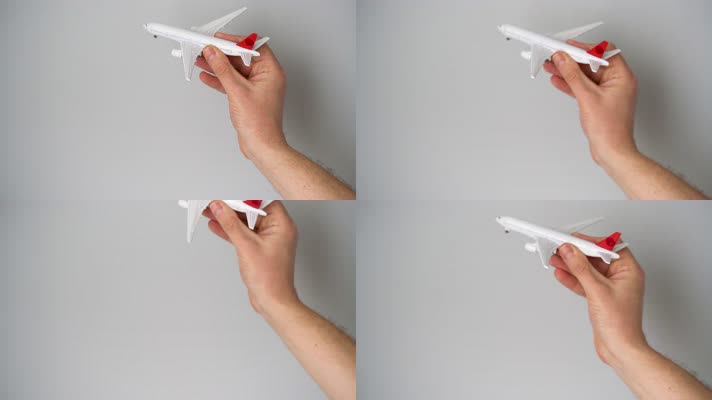 手拿玩具飞机 飞机模型  