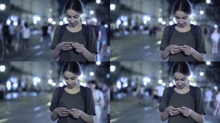 4k美女在繁华街头路口玩手机