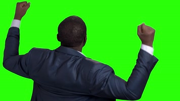 商务男士兴奋成功胜利高举双手