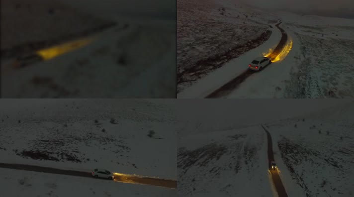 雪夜山间公路行使的汽车
