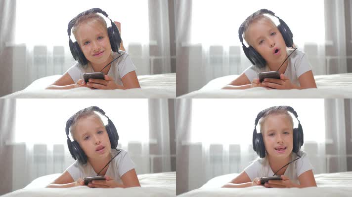 小女孩使用手机 操作智能手机 