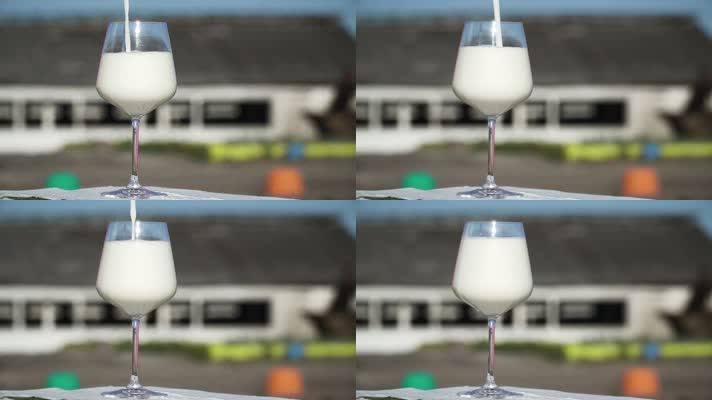 高清玻璃杯倒牛奶溶液慢动作镜头1