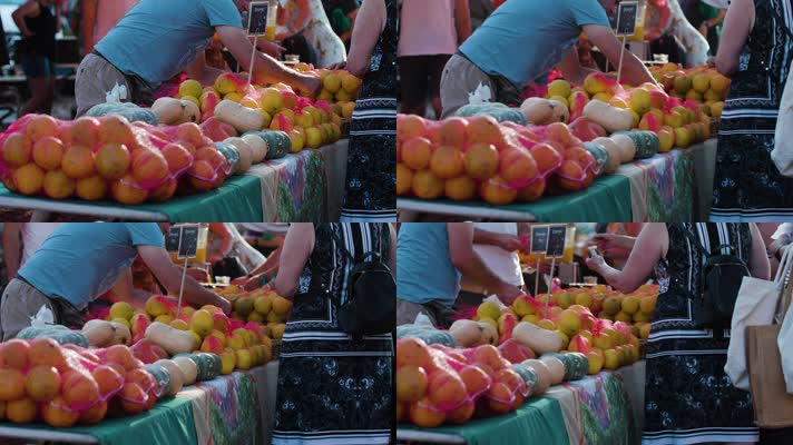 水果摊前买卖水果