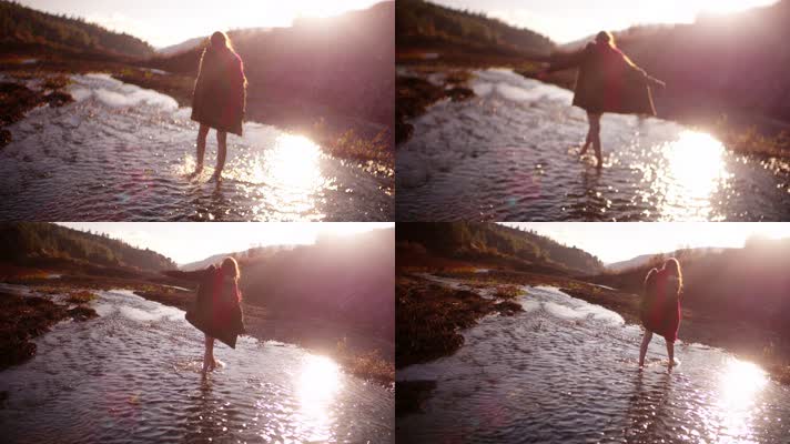 女孩在河水中光脚丫行走
