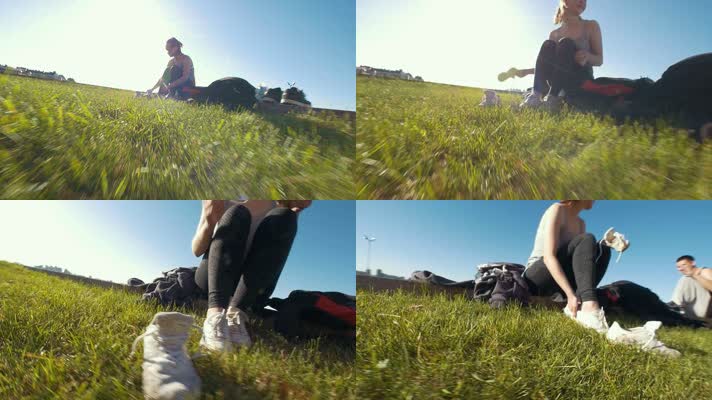 坐在草地上 穿鞋 运动  