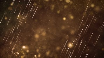 金色粒子洒落舞台背景