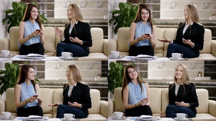 两位美女在沙发上手机交流 4K视频