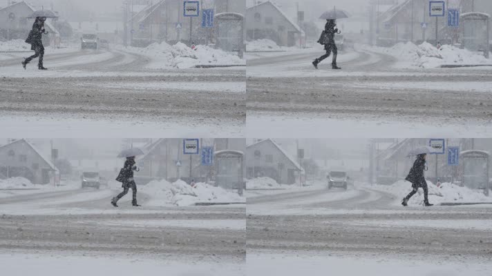 男子走在暴风雪的马路上 4K升格视频