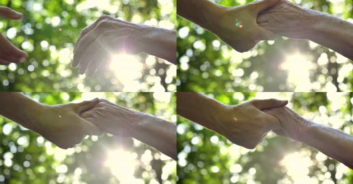 年轻人和老年人的手握在一起 4K视频