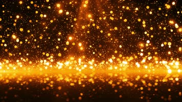 金色粒子海洋浪花翻滚背景