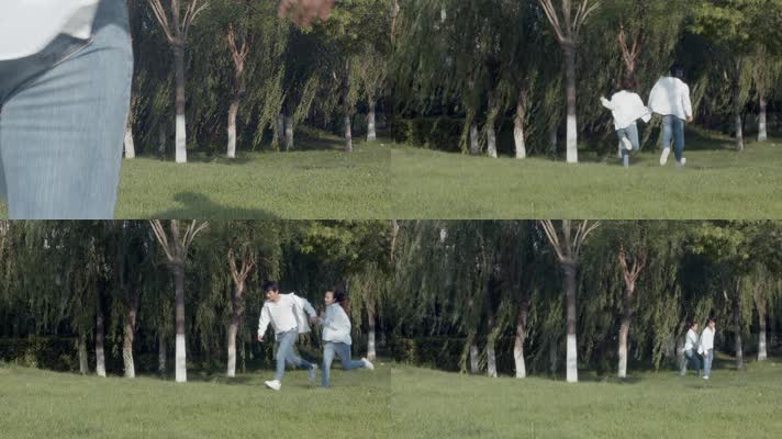 情侣在草坪上牵手奔跑