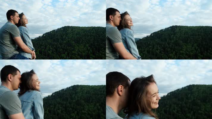 情侣在山顶拥抱