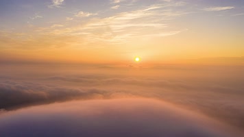 4k航拍风电机云海日出延时