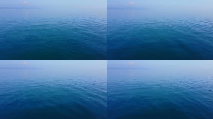平静蓝色水面，水平面海平面