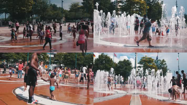 外国小孩喷泉玩耍