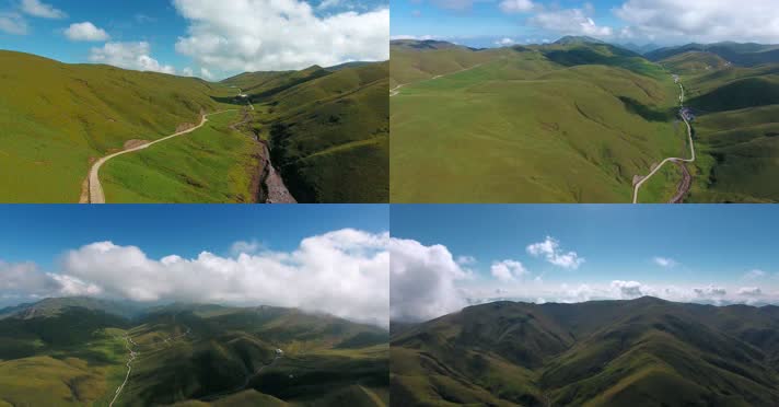 4k航拍蓝天白云下的绿色大草原连绵起伏群山