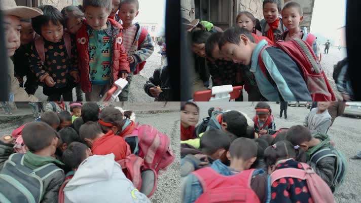 云南山区贫困小学生好奇的围观手机