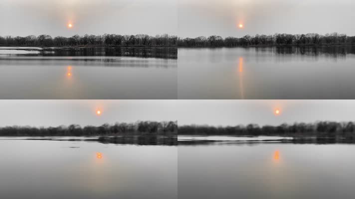 4K湖面镜面日落、水波涌向镜头