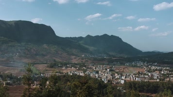 延时云南山区农村田园村庄光影变化袅袅烟雾