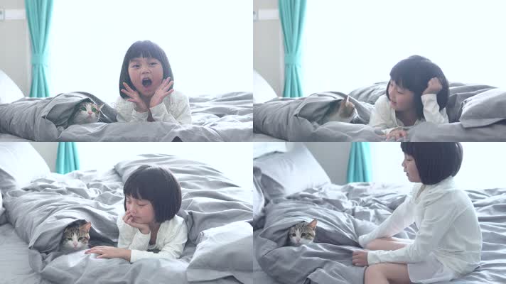 孩子与宠物猫在床上玩耍4k