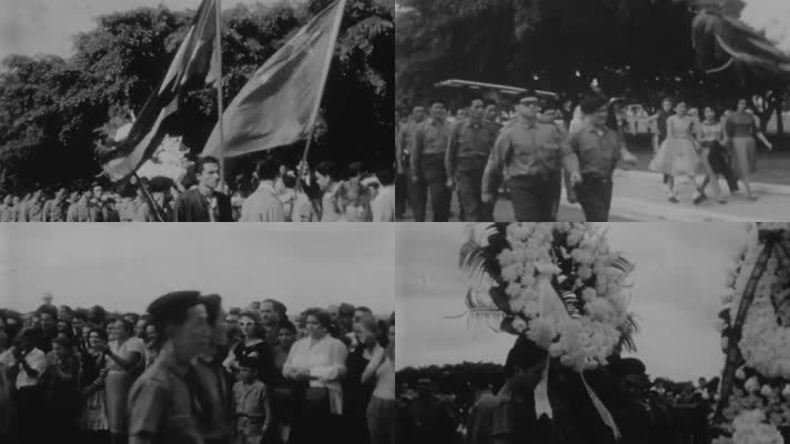 中国民兵队带着古巴和中国国旗游行
