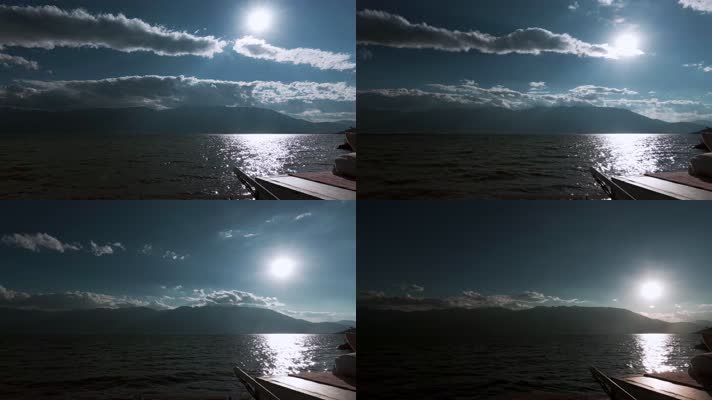 5.6k延时苍山洱海视频夕阳下的云层变化