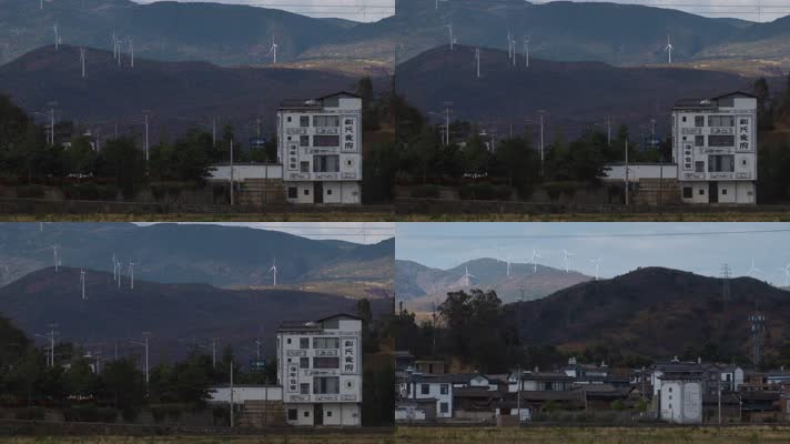 4k山村视频云南大理白族民居大山电力风车