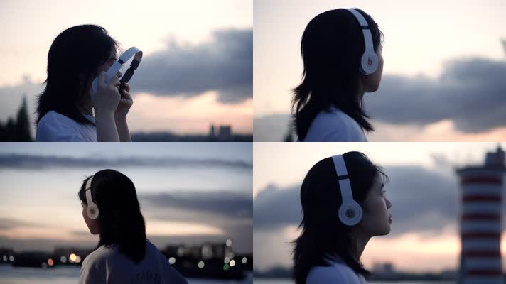 傍晚女孩在江边戴着耳机听歌4k