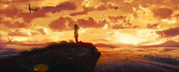 少年男子朝阳下投掷滑翔飞机