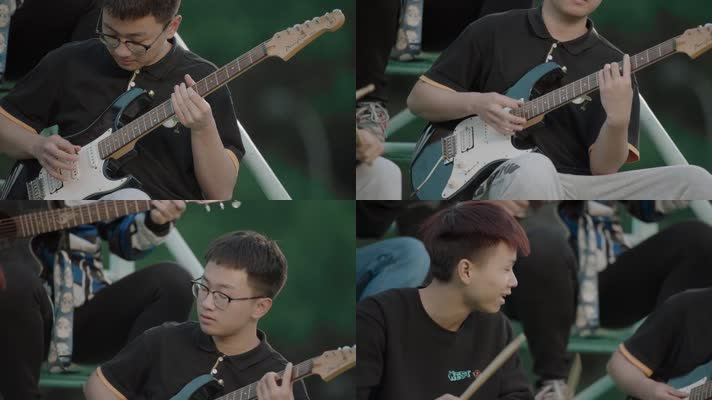 大学生弹吉他表演
