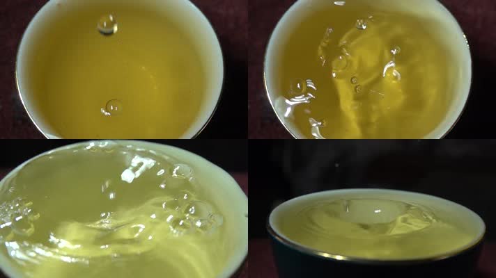 茶水水滴滴落到满满的茶杯中溅起水花儿慢镜