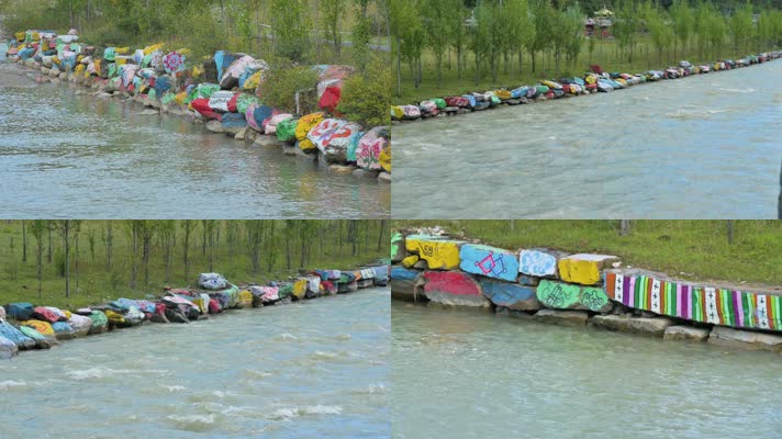 河堤河岸边藏式宗教彩色石头绘画保佑吉祥