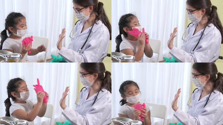医生正在和小女孩互动