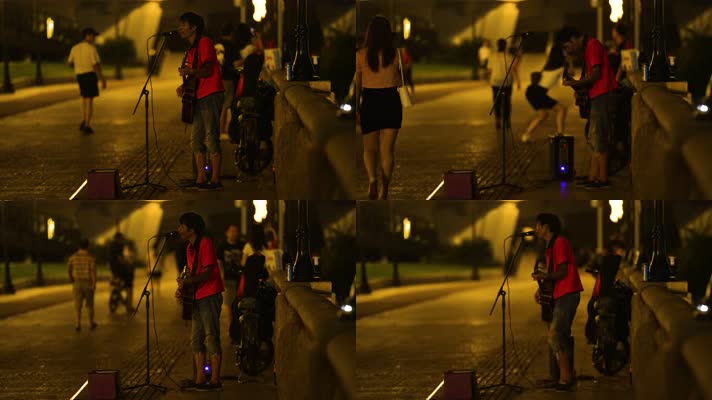 夜色下珠江边的街头艺人