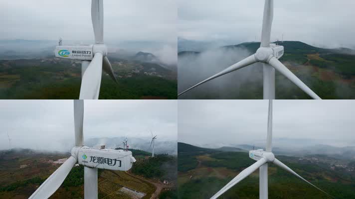 风力发电视频矗立在云层山颠的发电风车