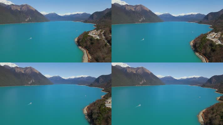 航拍西藏林芝青山蓝天下绿宝石般的巴松措湖