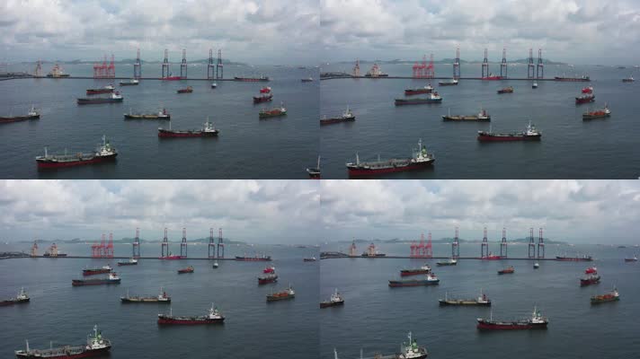 航拍放大装载机船舶运输港口周围的各种船舶