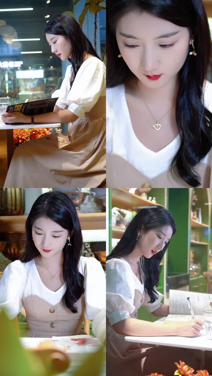 年轻女子咖啡厅看书思考写字