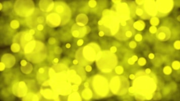 淡黄色粒子光晕背景视频