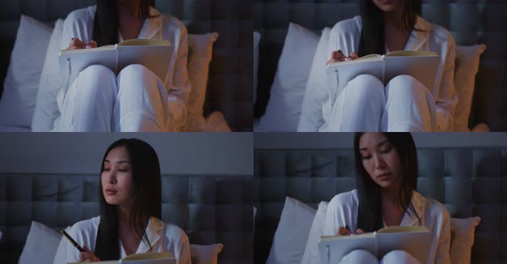 女孩在床上看书