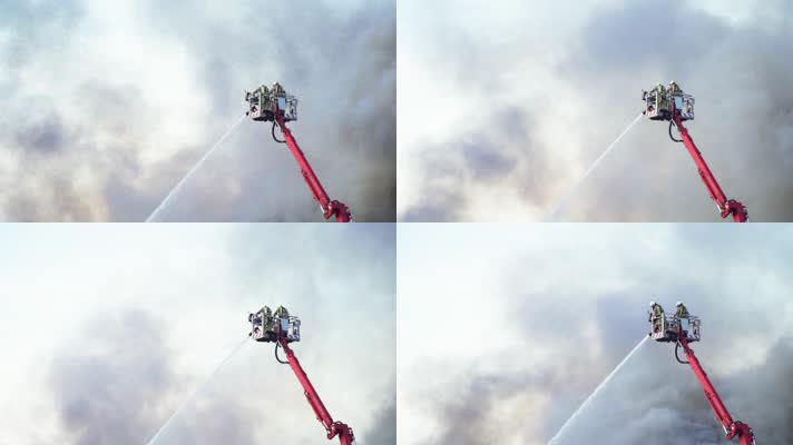 消防员在起重机上灭火
